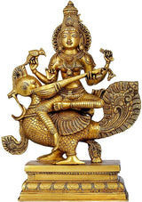 Gold brass Saraswati statue on peacock, holding a veena, 19 inches