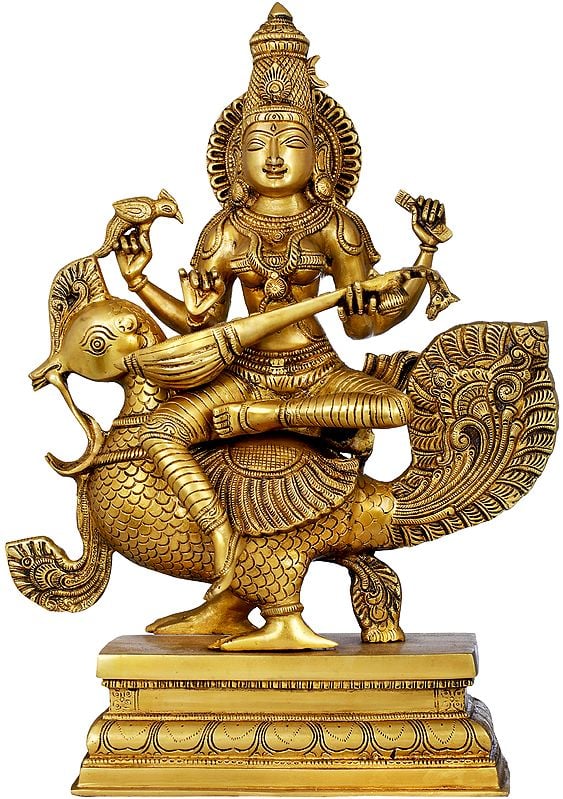 Gold brass Saraswati statue on peacock, holding a veena, 19 inches