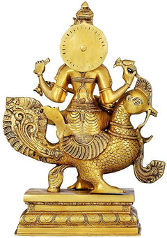 Gold brass Saraswati statue from behind, seated on peacock with circular halo