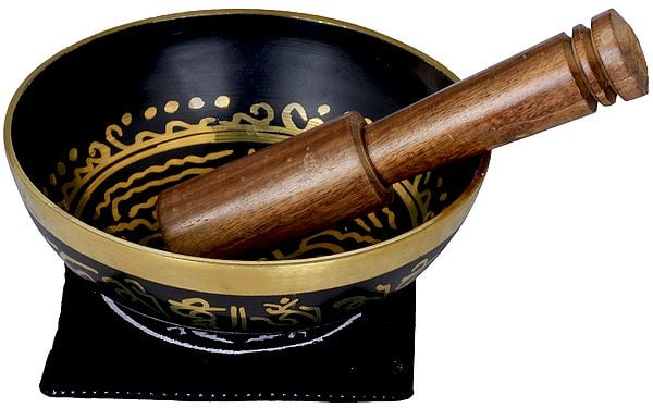 Brass Tibetan sound bowl with Vishwa Vajra design and wooden mallet