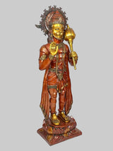 Hanuman blessing statue in reddish robe, holding golden pot, full-body view