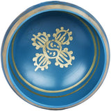 Blue singing bowl top with gold symbol and circular ring detailing; brass finish