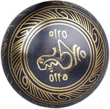 Singing bowl top with gold Om and decorative ring patterns on dark blue