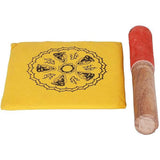 Cushion with Buddhist mandala motif and wooden striker with red felt tip