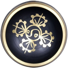 Black brass singing bowl interior with gold floral mandala design and rim detail