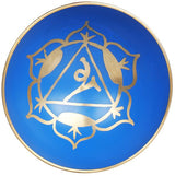 Blue yoni singing bowl lid with gold ornamental symbol in center