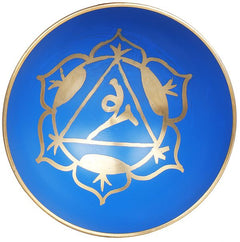 Blue yoni singing bowl lid with gold ornamental symbol in center
