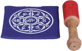 Purple cushion with white yoni pattern, paired with red-tipped wooden striker