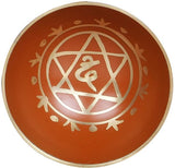 Brass Tibetan singing bowl, orange with white symbol engraving, 4 cm height