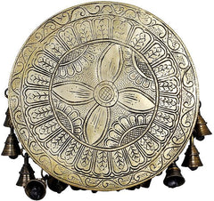 Brass ritual chowki top view with engraved floral mandala and small bell tips