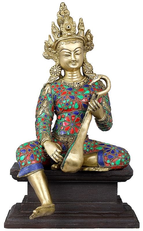 Handmade Devi Saraswati Seated on Wooden Pedestal in Brass 14 inches