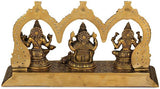 Brass Lakshmi, Ganesha & Saraswati Maa figures in perforated arch frame