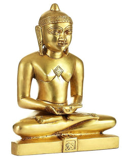 Brass Jain Tirthankara statue, three-quarter view with chest emblem and folded hands