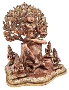 Dakshinamurti Shiva brass statue, raised hands, leaf-like circular halo