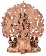 Rear view of brass Dakshinamurti Shiva statue with tree-like halo and base