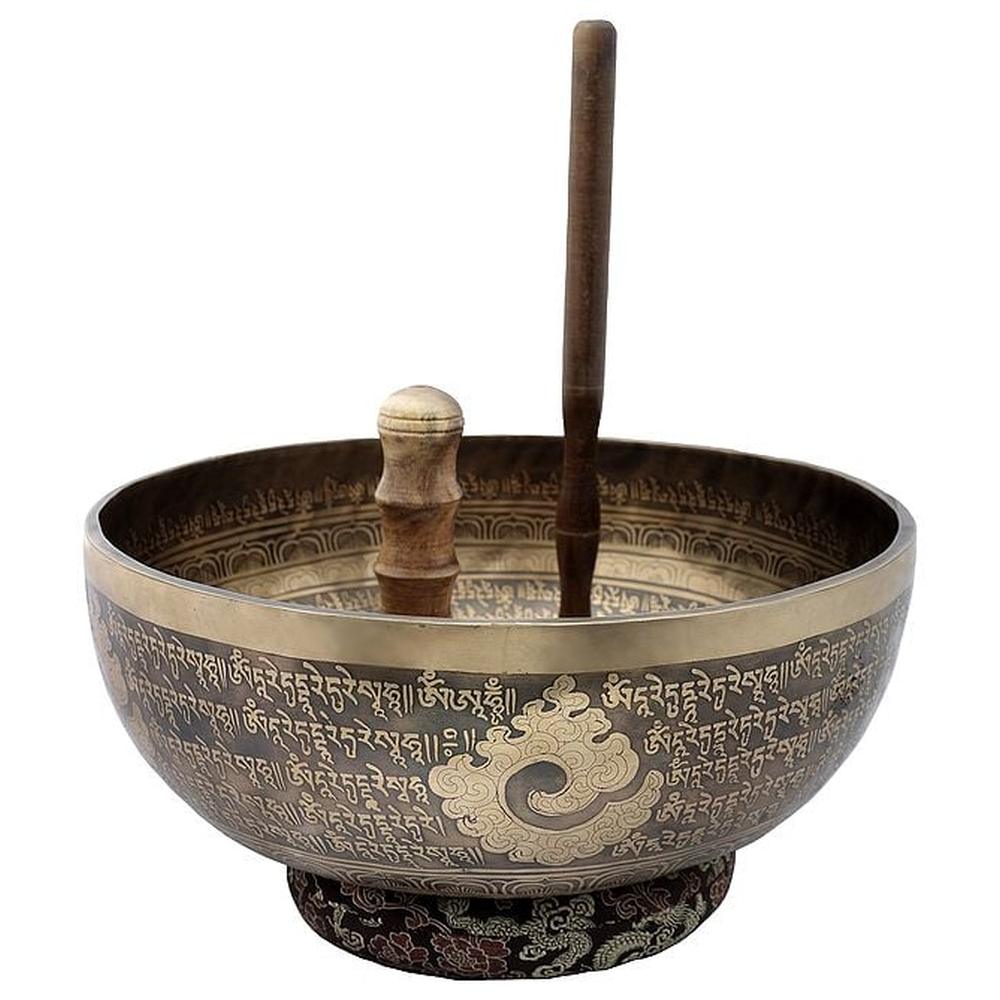 Brass Buddhist singing bowl with engraved Tibetan script and Tara motif, 5.5 in