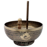 Brass Buddhist singing bowl with engraved Tibetan script and Tara motif, 5.5 in