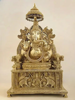 Brass Ganesha with Gaja Lakshmi carved pedestal sculpture, front view
