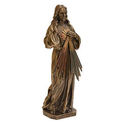 Side view Jesus polyresin statuette with robe folds and clasped hands