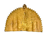 Brass wall hanging back with textured surface and scalloped top edge