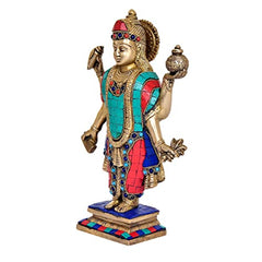 Brass Dhanvantri idol, standing pose with raised right hand, blue/red stone inlay dress