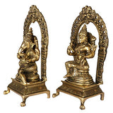 Brass Laxmi-Ganesha idol, standing with raised hands, side view