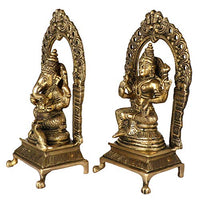 Brass Laxmi-Ganesha idol, standing with raised hands, side view