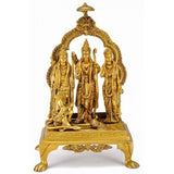 Brass Rama Darbar sculpture with three standing figures under ornate arch, on base