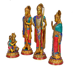 Brass darbar figurines front view: 3 standing statues with raised hands and 1 seated figure