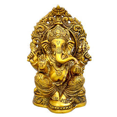 Handcrafted brass Ganesha idol, seated with ornate crown and trunk raised