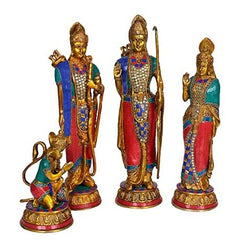 Brass darbar figurine set: 3 standing statues and 1 seated figure in colorful robes