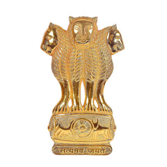 Gold metal Ashoka stambh wall decor close-up of lion faces and chakra base